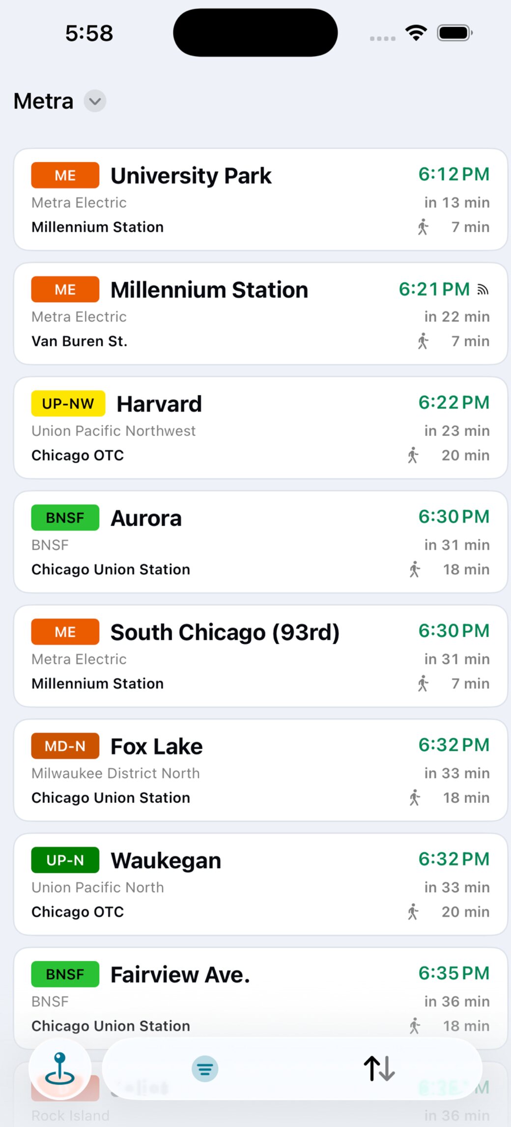 The Metra view in Stratus: University Park, Millennium Station, Harvard, Aurora and other departures with line badges and the time it takes to reach each one